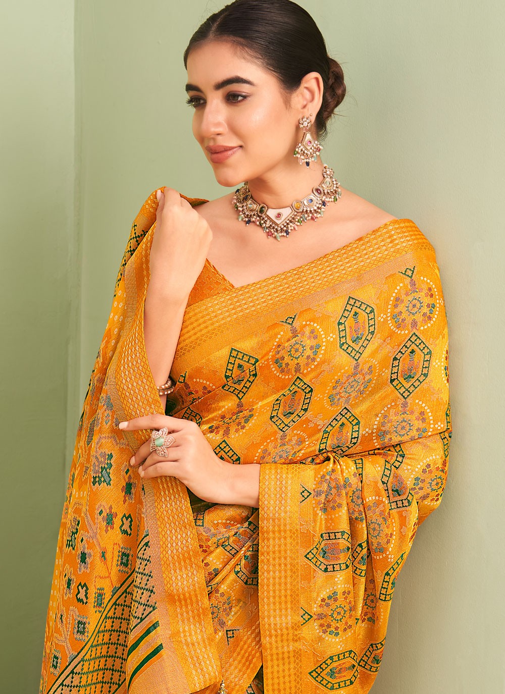 Contemporary Paisley Printed Yellow Georgette Saree S12791