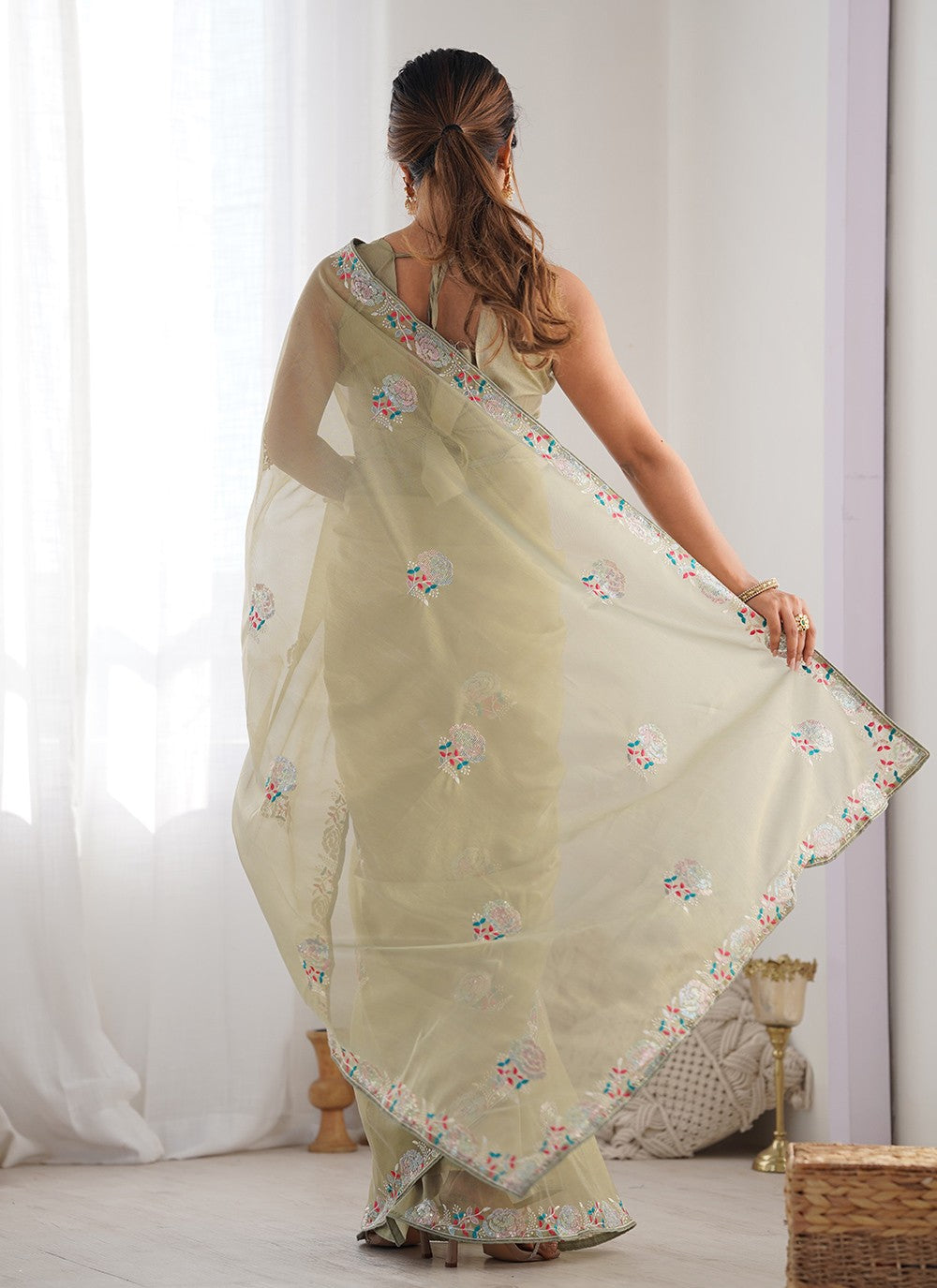 Contemporary Embroidered Green Net Saree S12465