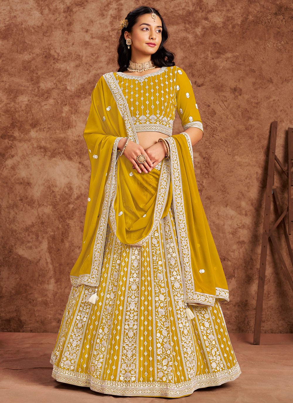 Embroidered Faux Georgette Yellow Lehenga - L3229