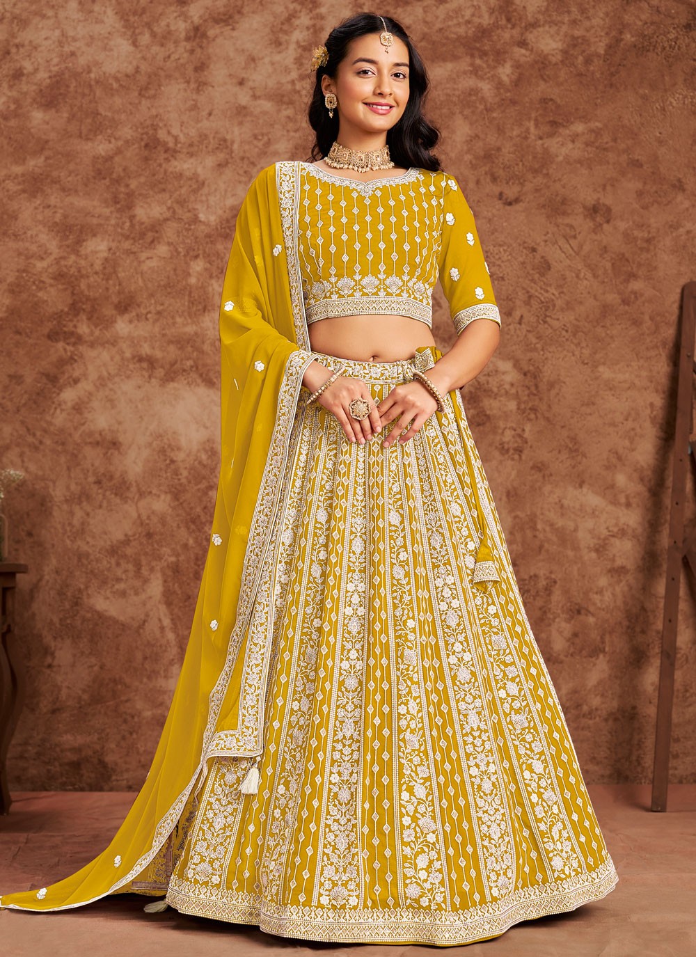 Embroidered Faux Georgette Yellow Lehenga - L3229