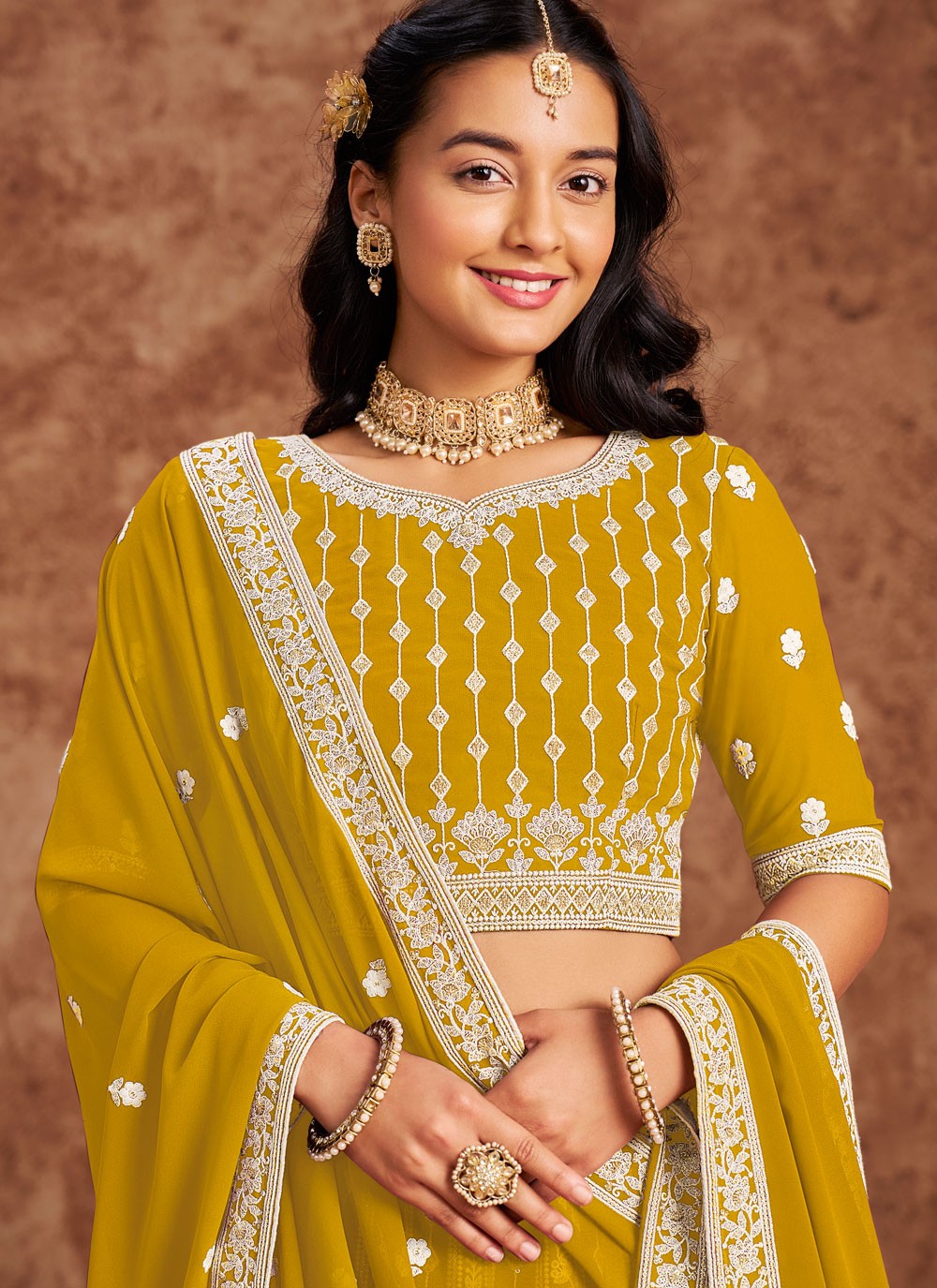 Embroidered Faux Georgette Yellow Lehenga - L3229